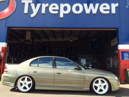 VY Commodore fitted with 20 inch Staggered FR1 Gloss White Simmons 