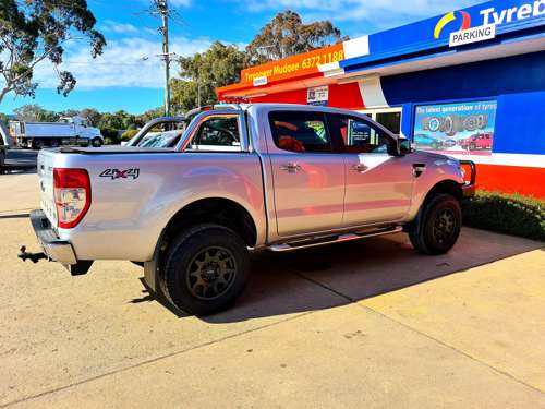 2014 FORD RANGER WEARING 265/70R17 COOPER AT3LT ON ROH INVADER . INCLUDED 2 INCH TOUGH DOG KIT 
