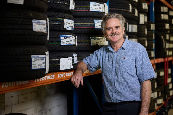 Bryn Sawford, store manager at Tyrepower West Perth, in front of premium tyre stock