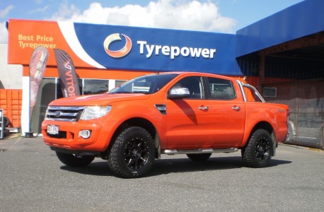Bright Ford Ranger needed some grounding and these Mickey Thompson ATZs Rims did the trick. New Spyder Rims look great. 